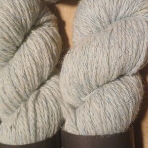 8 Skeins Of Julie Asselin Nurtured Yarn in Light Blue